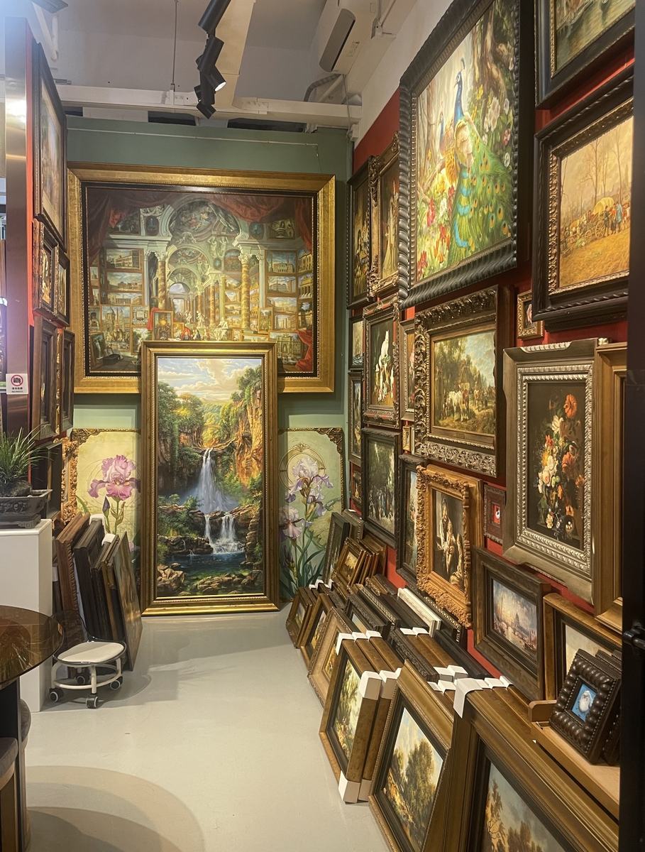 Long corridor inside our Dafen gallery — paintings floor-to-ceiling along the main hall